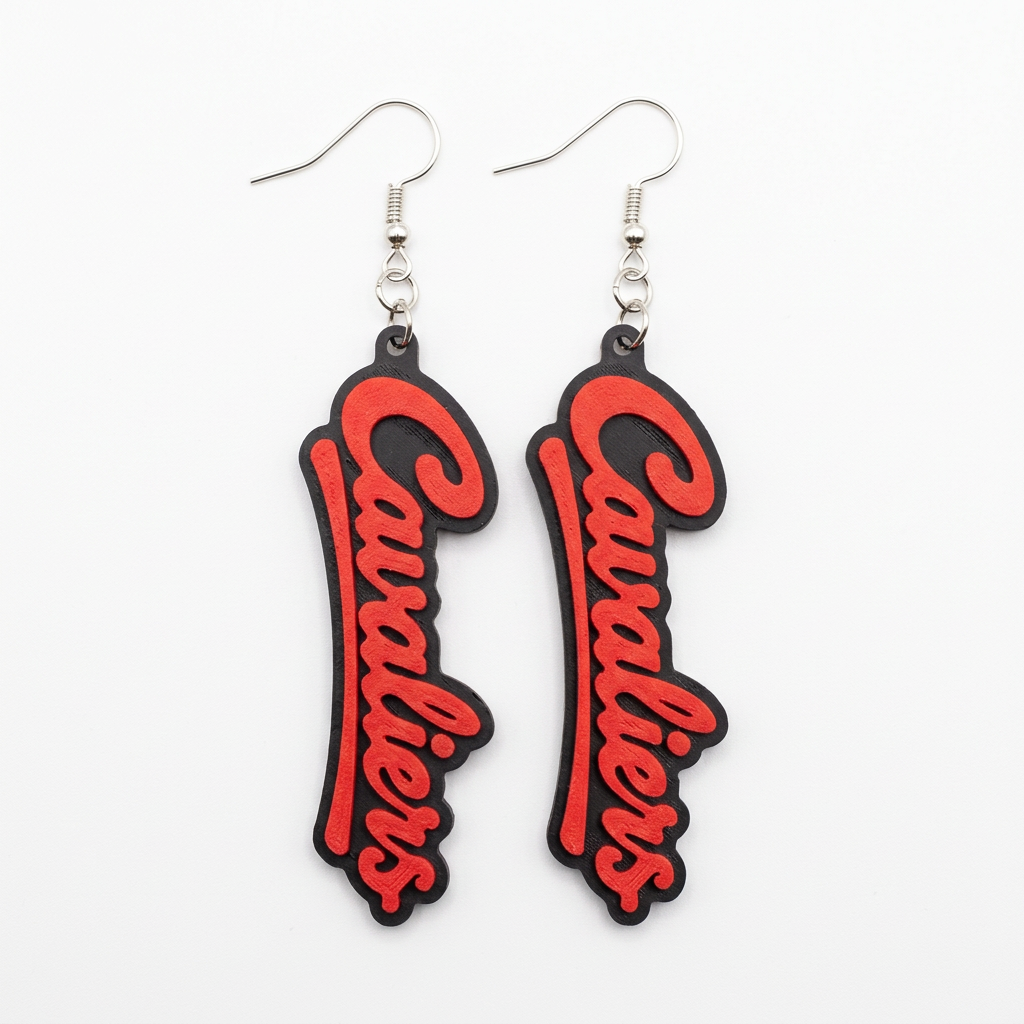 Red-and-black Cavaliers dangle earrings on a white background