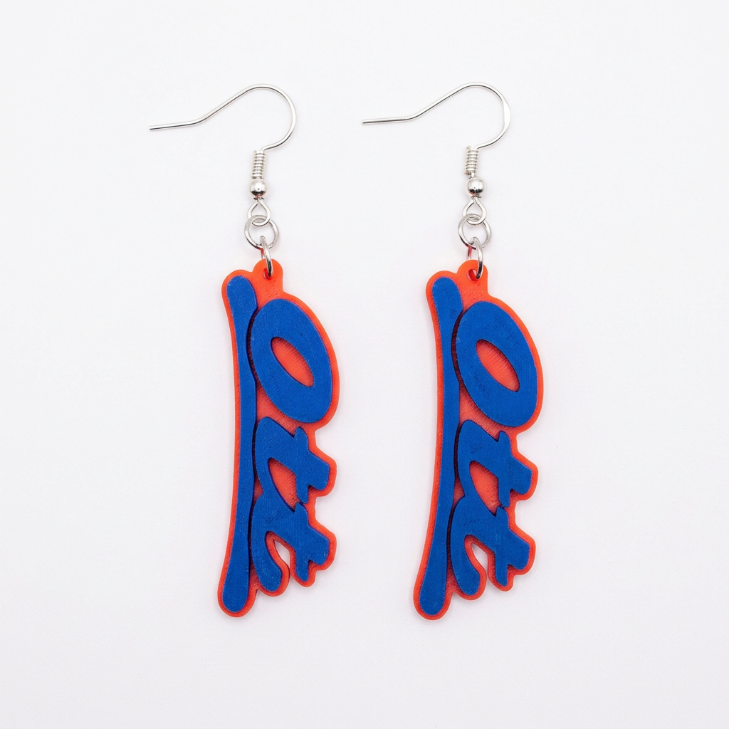 Ott earrings with richer red and blue on a clean white background