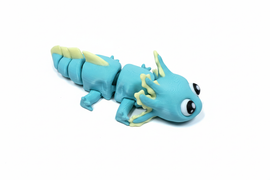 Turquoise and yellow articulated dragon on white background